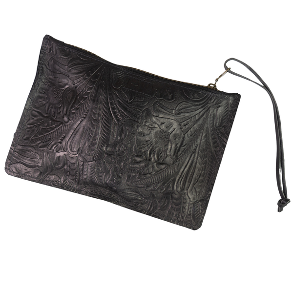 Good Tidings Styke Black leather wallet, One World Traveler Clutch, with intricate embossed design on a white background