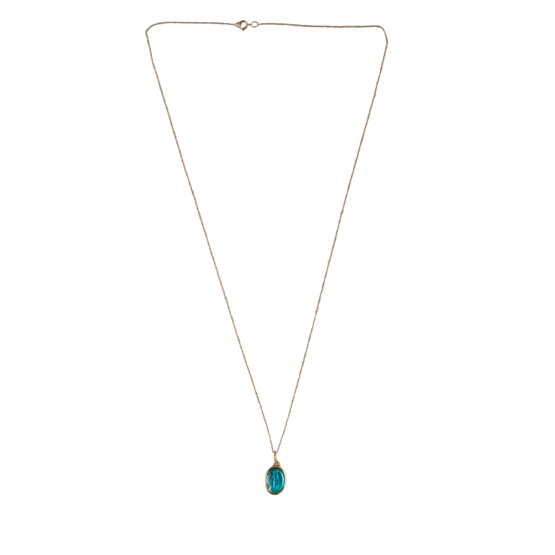 Gold Necklace with blue  medallion pendant on white background 