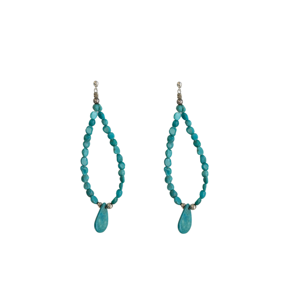 Pair of turquoise beaded earrings oval with s tear drop on the end on a white background
