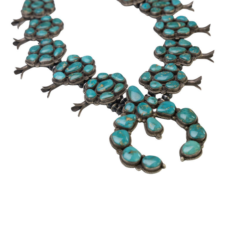 The Blue Tide Squash Blossom Necklace On White Background different angle